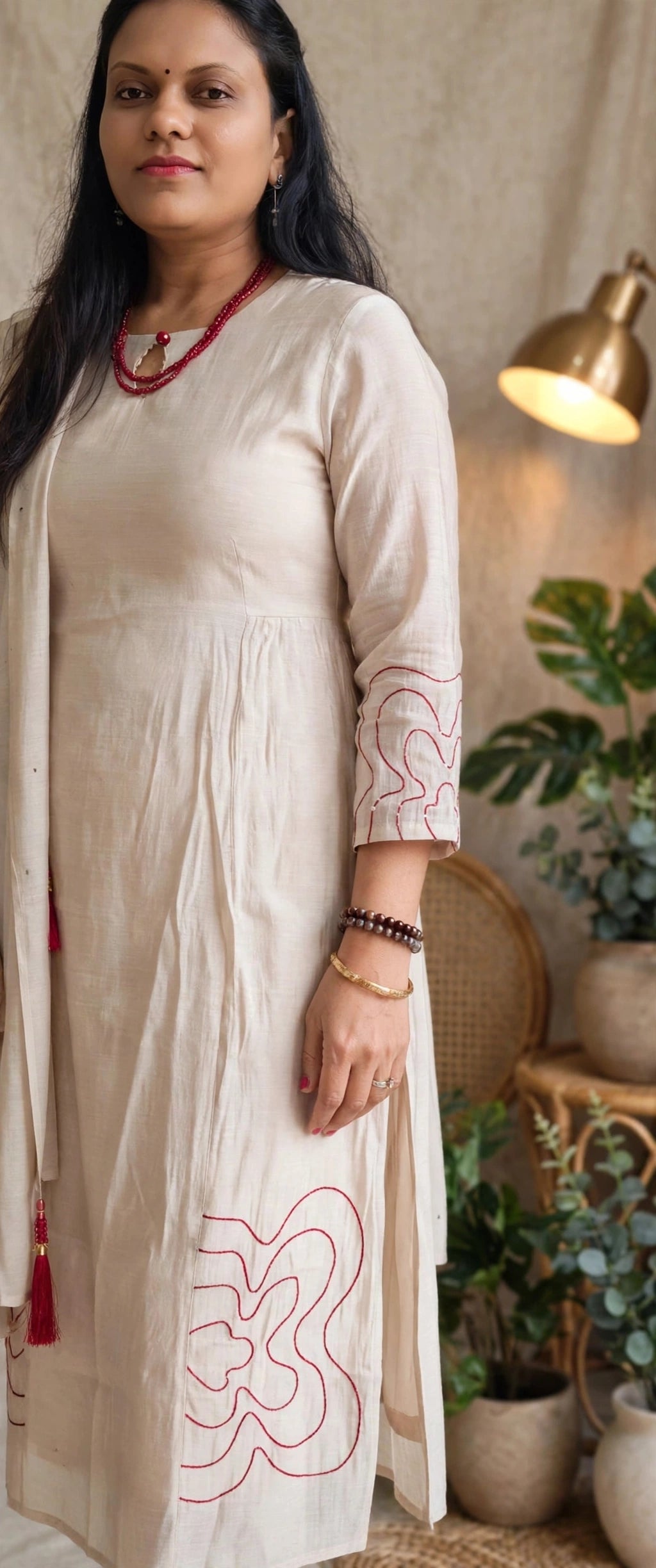 Ivory Chanderi Cotton Kurta Set with Maroon Contour Line Embroidery & Tasselled Dupatta