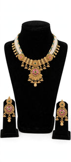 Rajwada – Antique Gold Finish Multi-Strand Pearl Necklace Set with Ruby-Pink Floral Pendant