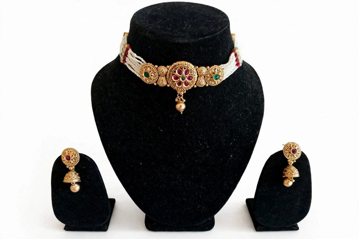 Kumudini – Antique Gold Finish Floral Pearl Choker Set with Jhumka Earrings