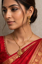 Shri – Antique Gold Finish Lakshmi Temple Pendant Set with Jhumka Earrings